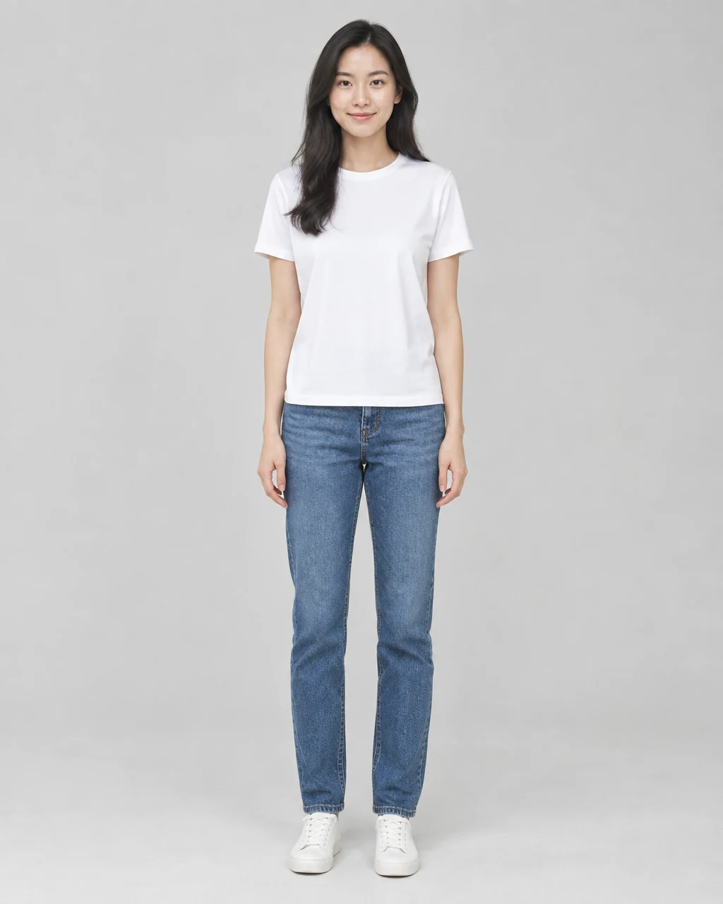 Woman in a white T-shirt and jeans before an AI outfit change